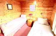 Bedroom 5 Braemar Lodge Cabins