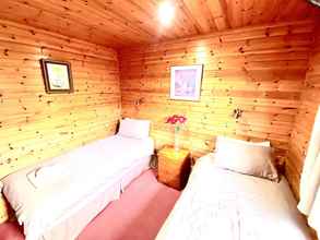 Bedroom 4 Braemar Lodge Cabins