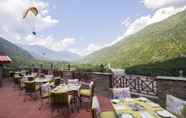 Restaurant 2 Regenta Inn Blossoms By Riverside Manali