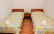 Bedroom 4 Apartments Šantić