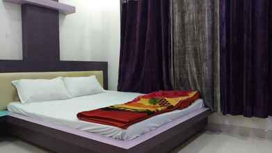 Phòng ngủ 4 Hotel Nikunj