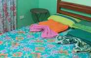 Kamar Tidur 6 Sunday Cocoon Guesthouse 2