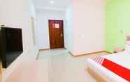 Kamar Tidur 4 Green Orange Express Inn