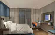 Bedroom 7 Holiday Inn Express E'Mei Qiliping, an IHG Hotel