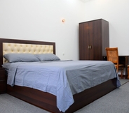 Kamar Tidur 6 Nurziyo Guest House