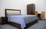 Kamar Tidur 6 Nurziyo Guest House