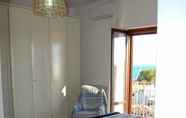 Kamar Tidur 3 B&B Il Faro