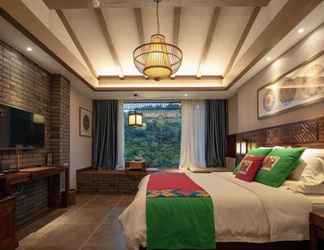 Bedroom 2 Guilin Hantang Xinge Hotel Two Rivers and Four Lakes Branch