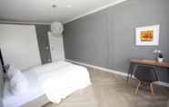 Bedroom 3 Zollikof Aparts - Sauna & Studioapartments