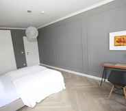 Bedroom 3 Zollikof Aparts - Sauna & Studioapartments