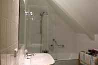 Phòng tắm bên trong Hotel des Bains