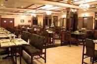 Restaurant IROOMZ Hotel Trupti International