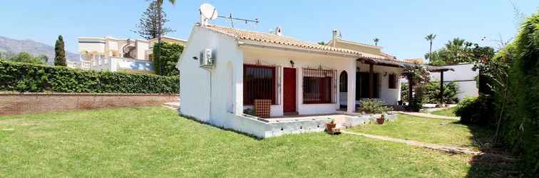 Bangunan Villa Maria. Barbacoa piscina y jardín