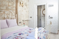 Bilik Tidur Kybele Suites Alacati