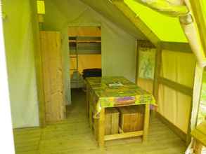 Bedroom 4 Camping Les Poutiroux - Tente Lodge