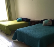 Kamar Tidur 4 Rua Hotel