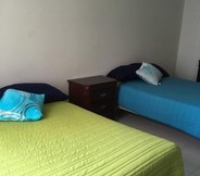 Kamar Tidur 3 Rua Hotel