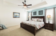 Bedroom 4 8BR 8BA Pool Home Near Disney In Gated