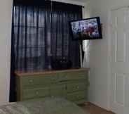 Bedroom 4 3BR 2BA Townhome Close to Disney