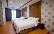 Kamar Tidur 7 Flower Style B&B