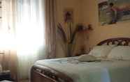 Phòng ngủ 2 Villaggio Fabra Casa Mia e non solo...