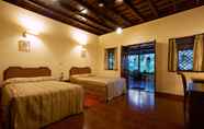 Bedroom 7 Tranquil Resort Wayanad