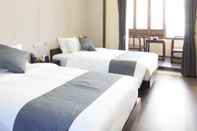 Bedroom Floral Hotel Xidi Muxishanfang