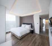 Bedroom 7 Flyzoo Hotel - Alibaba