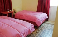 Kamar Tidur 6 Modern Hotel Falougha