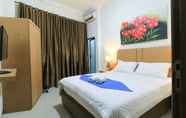 Bedroom 5 Labuana Homestay & Cafe Garden