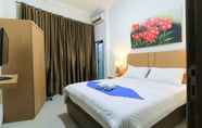 Bedroom 6 Labuana Homestay & Cafe Garden