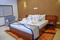 ห้องนอน Saru Blue Sapphire Hotel