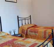 Bedroom 2 B&B Le Due Corti