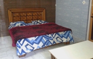 Kamar Tidur 4 Hotel Nirmal Lodge