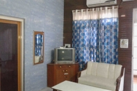 Kamar Tidur Hotel Nirmal Lodge