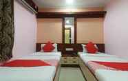 Bedroom 6 Hotel Nirmala Residency