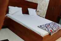 Bedroom Hotel Nirmala Residency