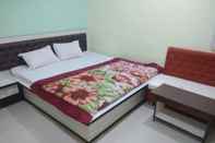 Phòng ngủ Kalpshil Hotel