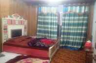 Bedroom Green Palace Guest House Malam Jabba