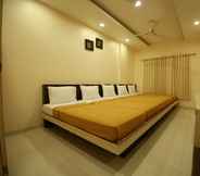 Bedroom 4 Hotel Madhuri Executive