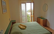 Bedroom 6 Guest House Medine