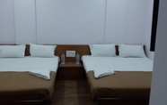 Phòng ngủ 7 Rajhuns Deluxe Lodging