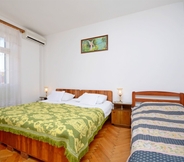 Bedroom 3 Apartment and Rooms Dragana