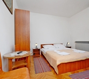 Bedroom 5 Apartment and Rooms Dragana