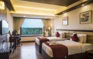 Phòng ngủ 4 Kpm Tripenta Hotel