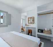 Bedroom 4 Bianco Diverso Suites