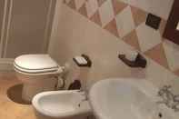 Phòng tắm bên trong Antico Borgo di Vallignano
