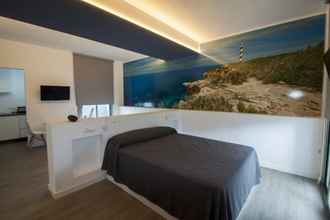 Kamar Tidur 4 Hostal Sa Vinya Suites