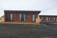 Exterior Black Beach Small Cottage