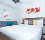 Kamar Tidur 5 Metro Service Apartments-Langley House